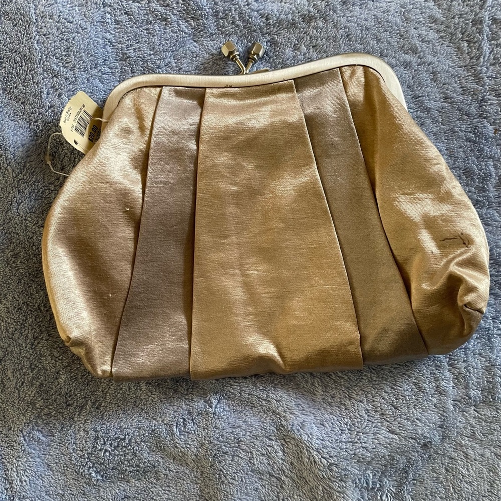 FREE WITH PURCHASE OF 25.00 or more- nwt snap clutch/ make up bag